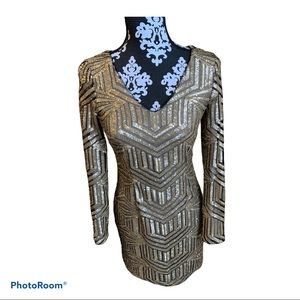 Gorgeous matte gold sequined mini dress.